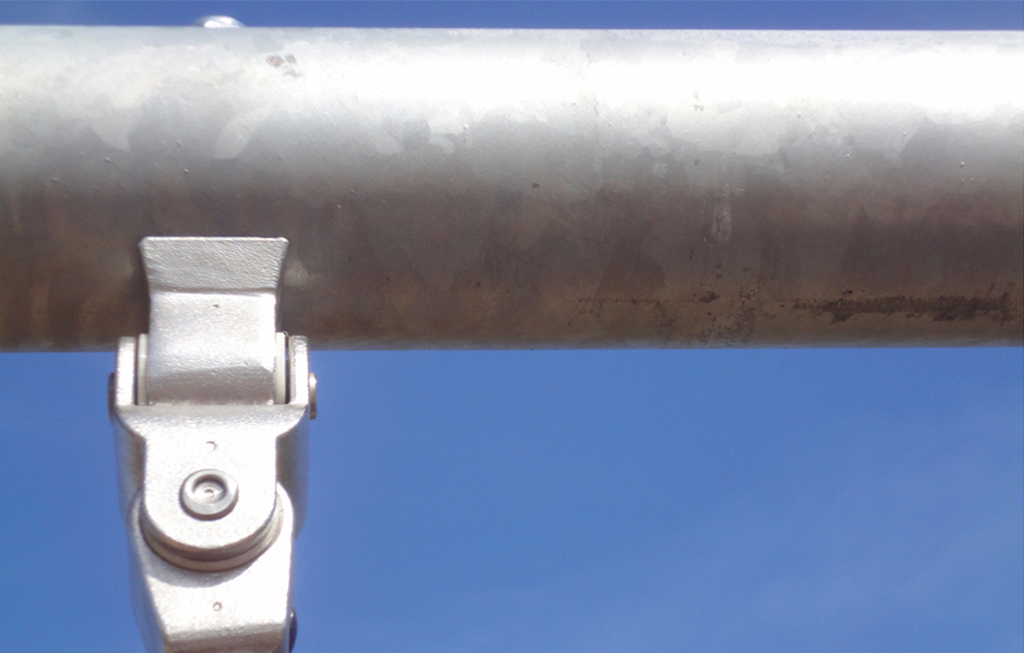 The horizontal beams of the swings