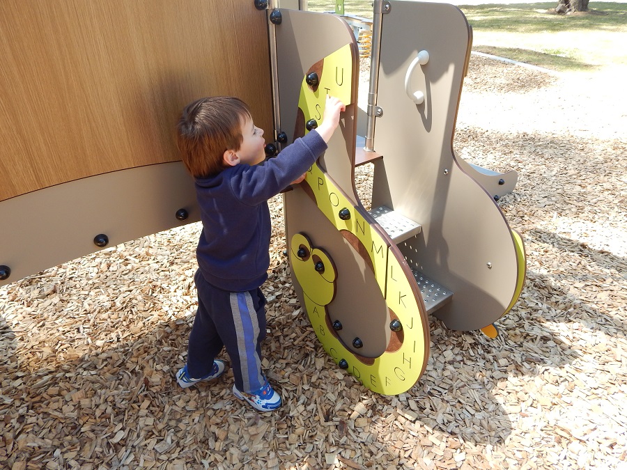 Child playing at Cummins Reserve Playground