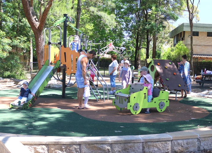 child playing at Frank Beckman Playground