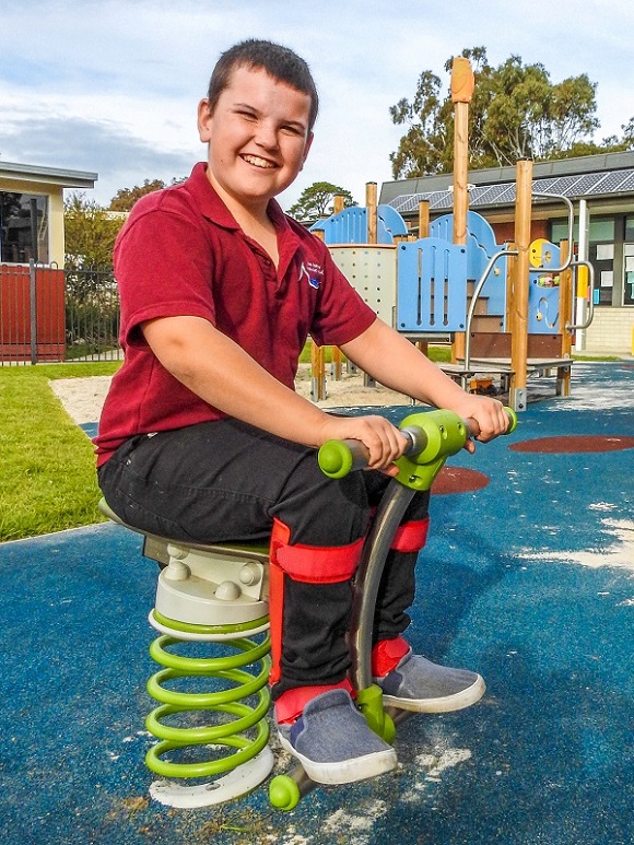 Child playing on springer at East Gippsland Specialist School Playground