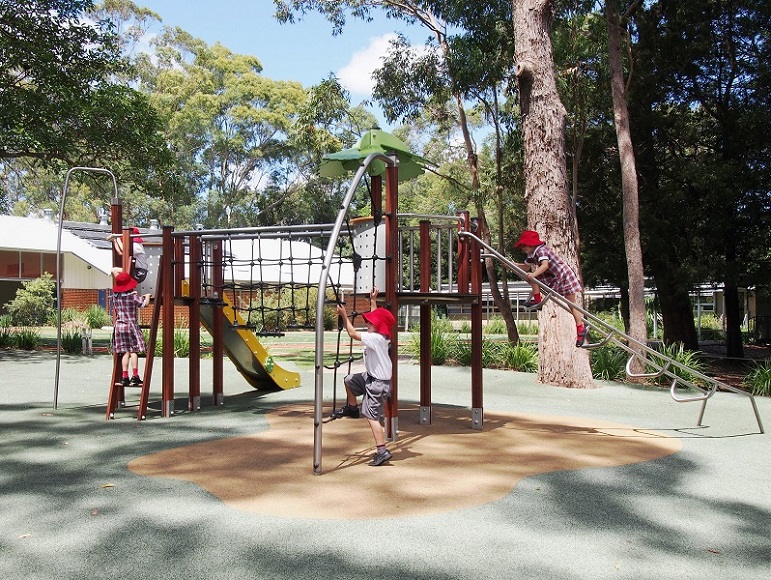 Child playing at Warrawee Public School Playground