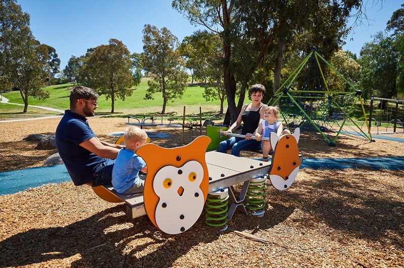 Child playing on a springer at Austin Crescent Reserve playspace