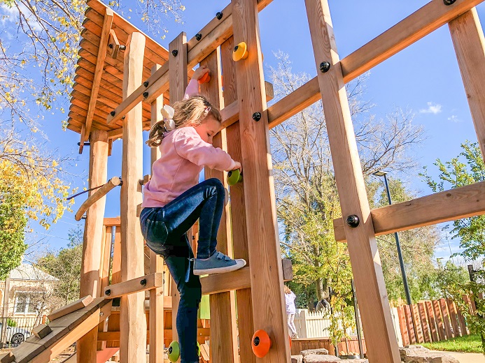Child playing at Victory Square Playground