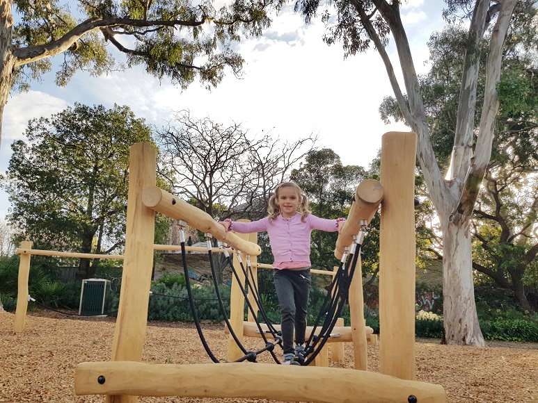 Child playing at Kooyong Gardens Playground