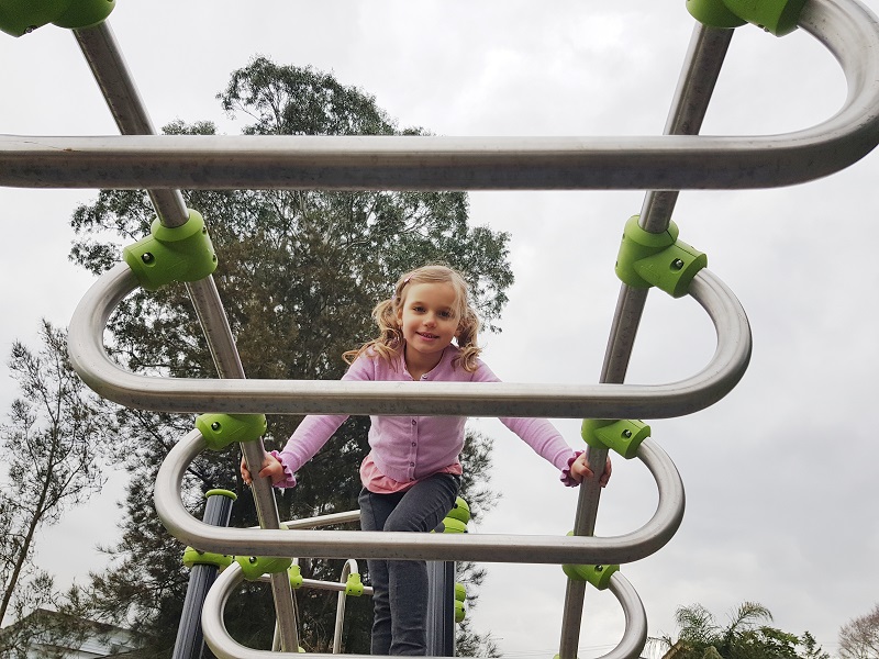 Child playing on an arch at Anthony Reserve Playground