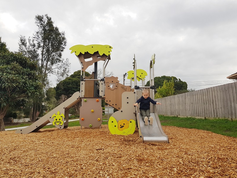 Child playing on a slide at Anthony Reserve Playground