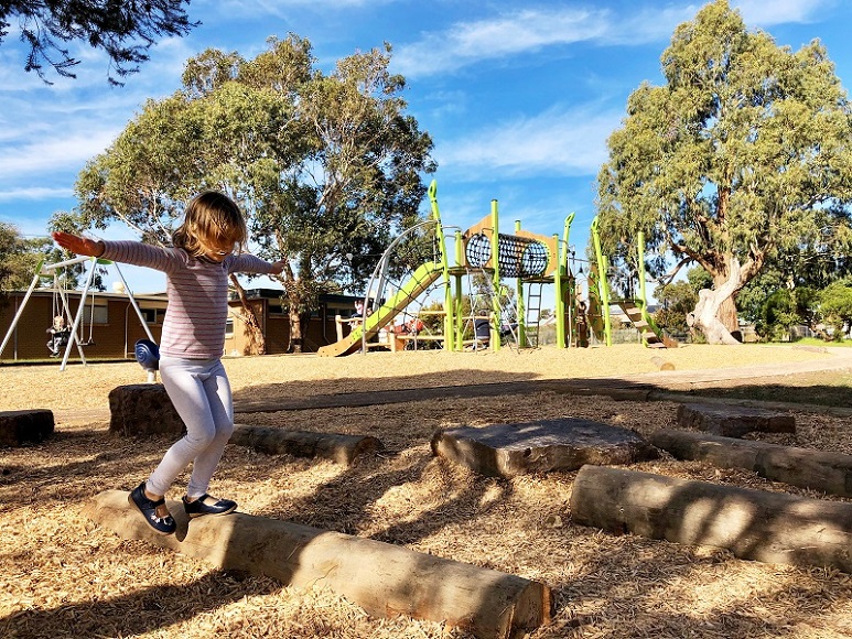 Child playing at Harold Hughes Reserve Playground