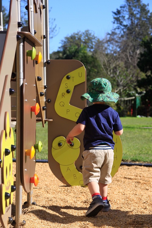 Child playing at Joe Foster Park playground