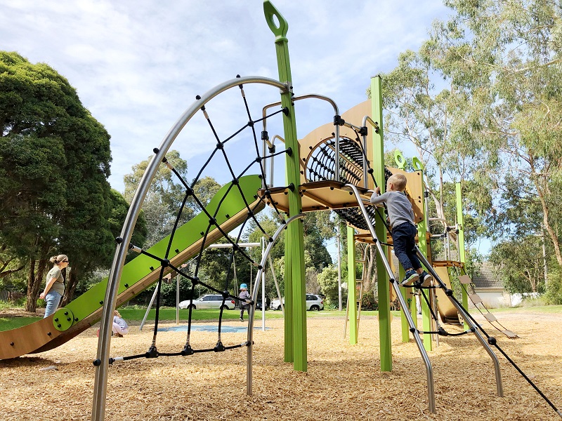 Child playing at Naughton Patch Playspace