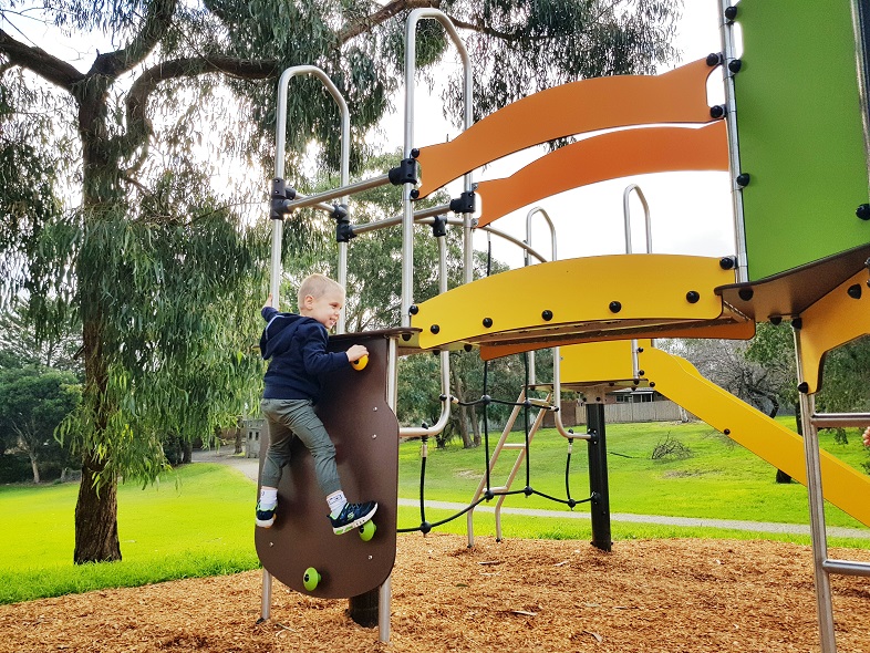 Child playing at Rees Street Reserve Playground