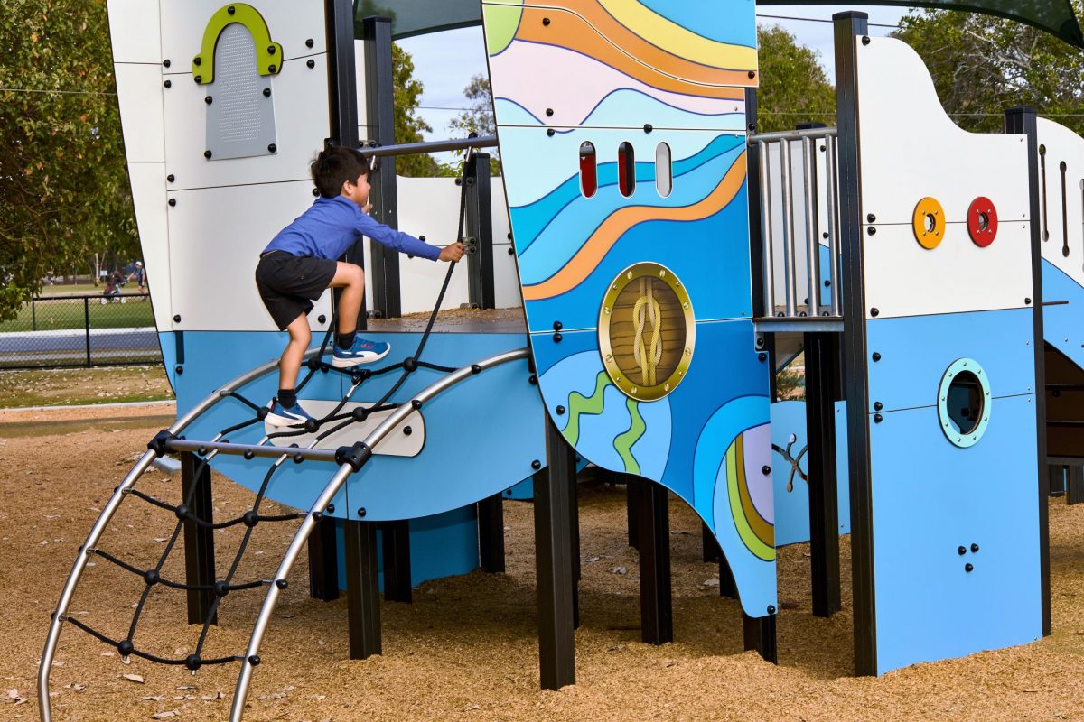 Child climbing up a net