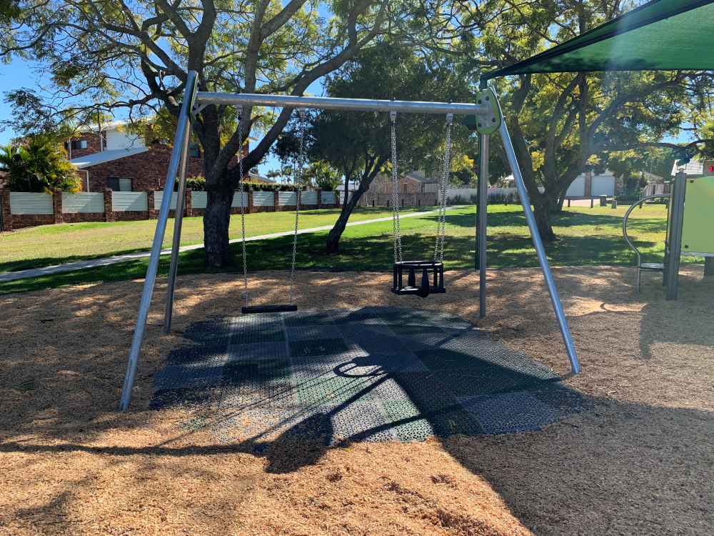 Swing set at Robtrish Street Park Playground
