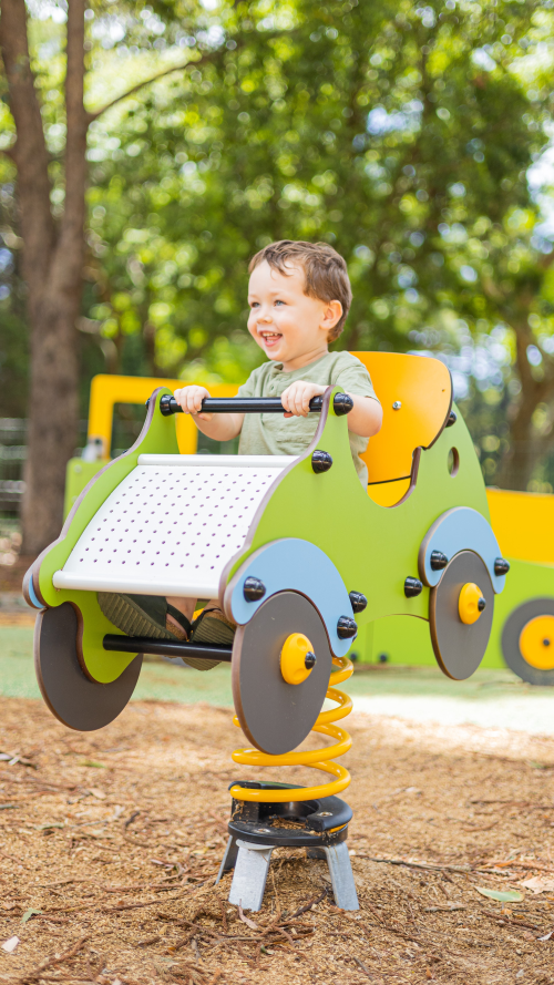 Child on car springer play item