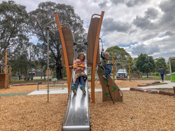 Children playing on a slide
