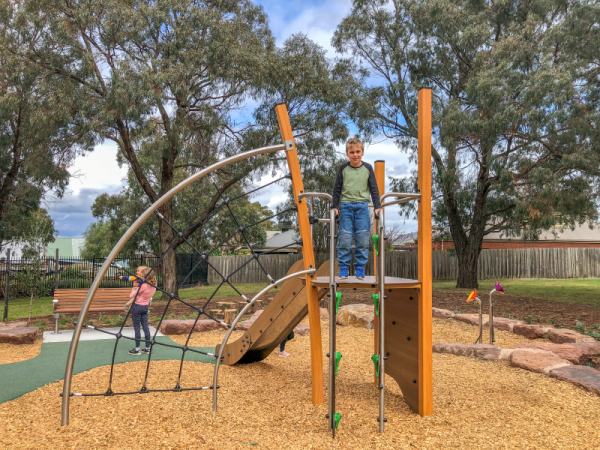 Children playing with Slide and Climbing Unit