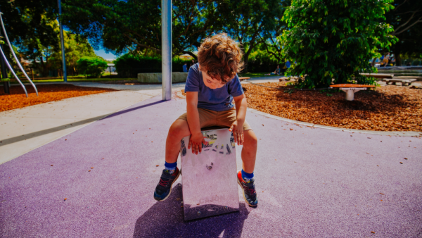 Child playing cajon