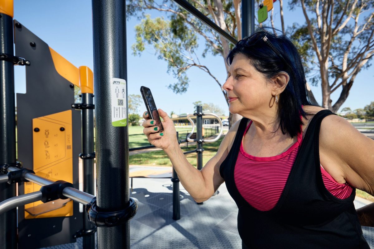 Qr codes on fitness equipment that are linked to exercise videos