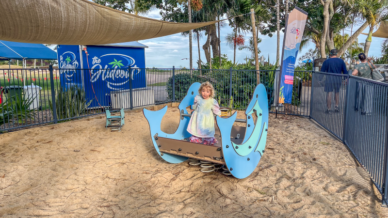 Child on dolphin springer at GKI Seaway Trail Playground