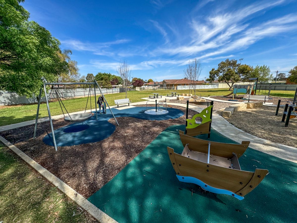 Borland Leckie Park Playspace Boat Springer and Playhouse