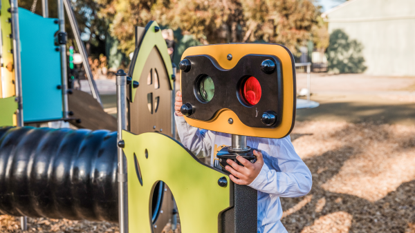 Child using visual play equipment