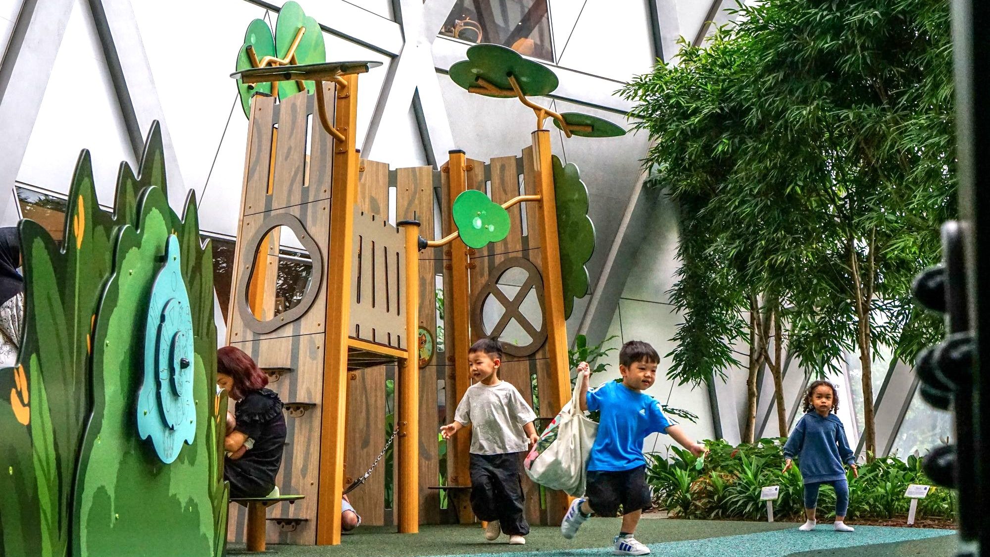 Children playing at Jewel Changi Airport Playground in Singapore